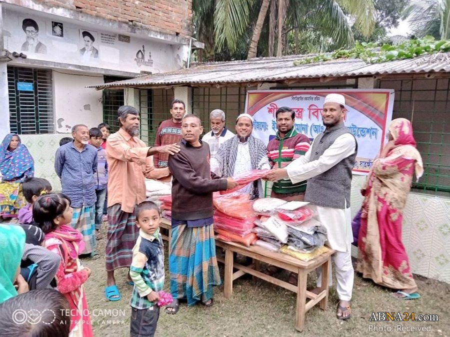 Photos: Shiites distribute warm clothes to needy people in Bangladesh