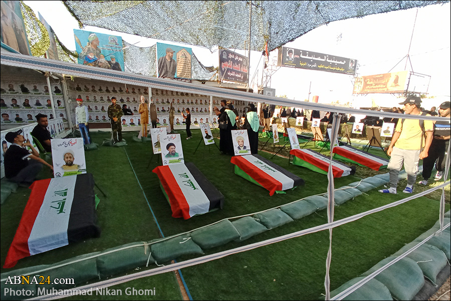 گزارش تصویری/ نمایشگاه شهدای الحشد الشعبی در مسیر پیاده روی اربعین 