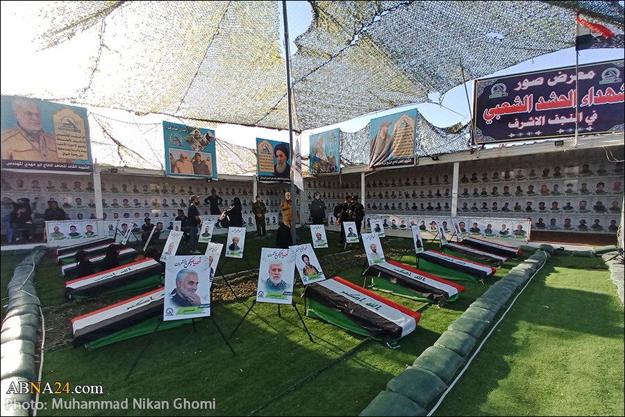 گزارش تصویری/ نمایشگاه شهدای الحشد الشعبی در مسیر پیاده روی اربعین 